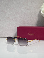 Cartier eyeglasses with gold-tone metal frame and smoke-to-rose lenses, side view.
