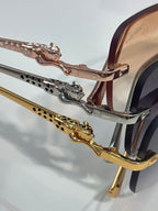 Close-up of Cartier eyeglass frame temple with gold-and-silver decorative links