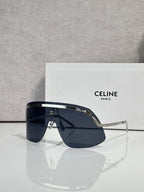 Celine sunglasses with navy lenses and silver metal frame, squared shield silhouette