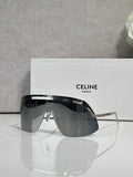 Celine sunglasses with dark gray lenses and silver metal frame, oversized shield shape