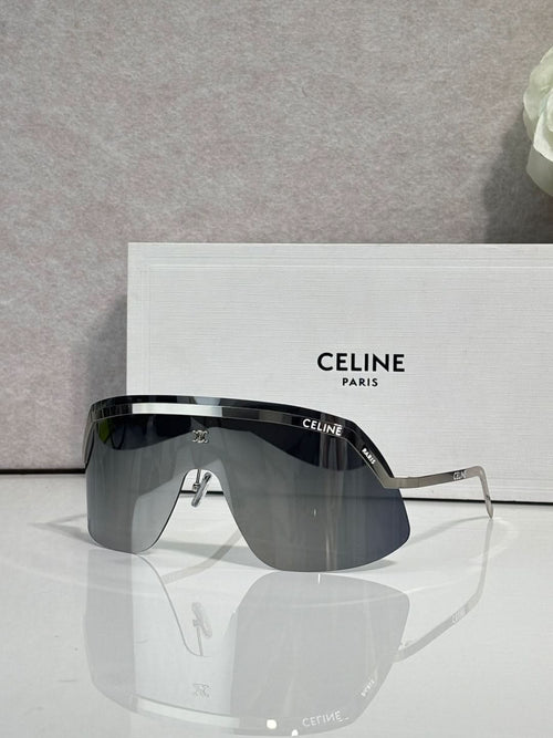 Celine sunglasses with dark gray lenses and silver metal frame, oversized shield shape