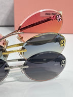 MiuMiu round sunglasses close-up, stacked lenses, gold metal frame with logo tips
