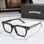 Black rectangular eyeglass frames with gold textured temple arms and clear lenses
