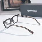 Black eyeglass frames with silver rhinestone-style temple bars and brown patterned arms