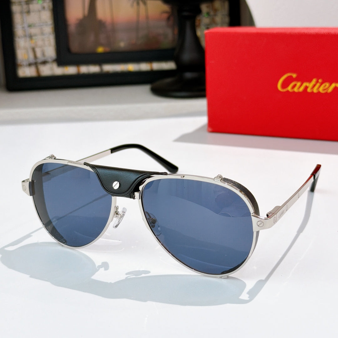 Cartier sunglasses with silver frame and blue tinted lenses, black temples