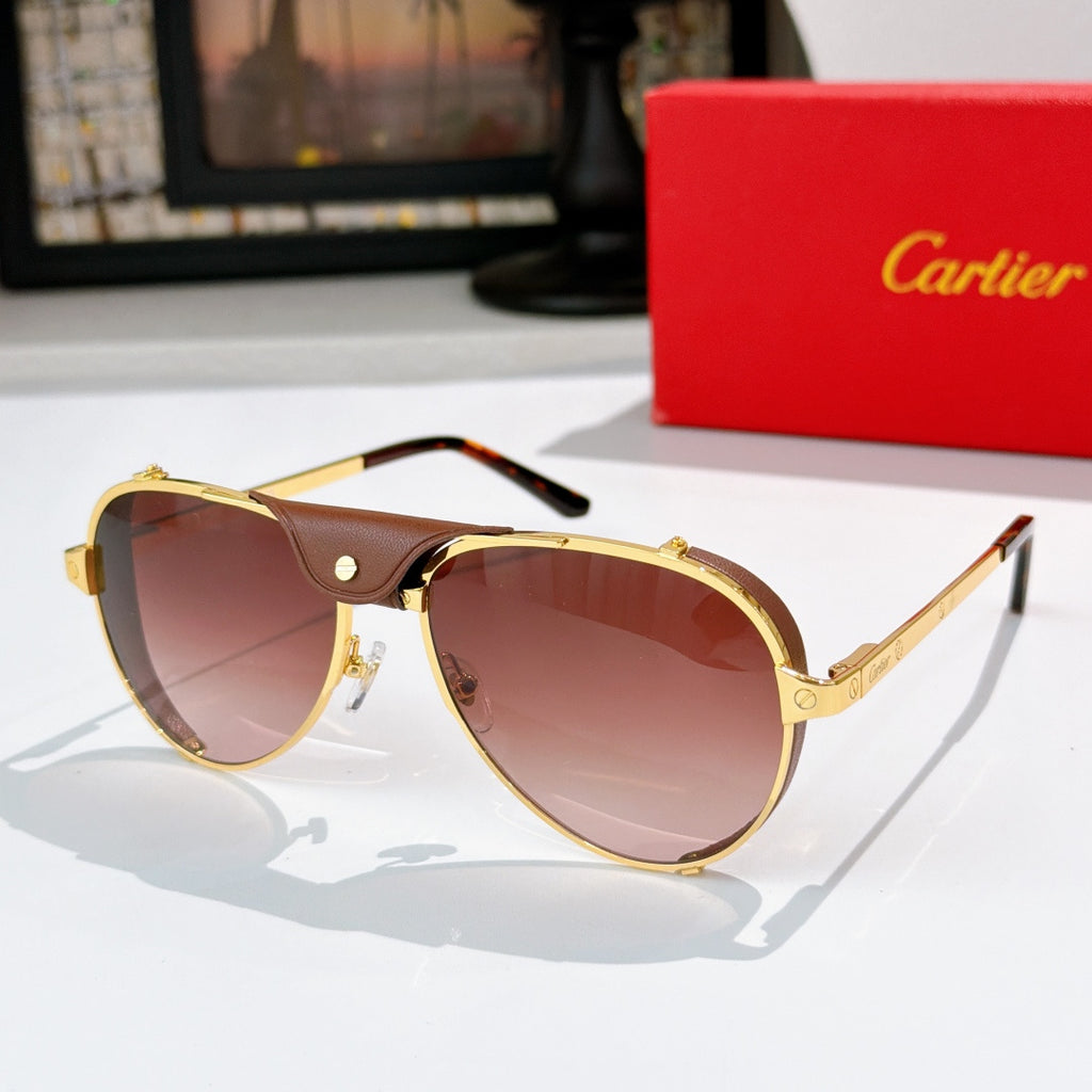 Cartier sunglasses with gold frame and warm brown tinted lenses, black temples