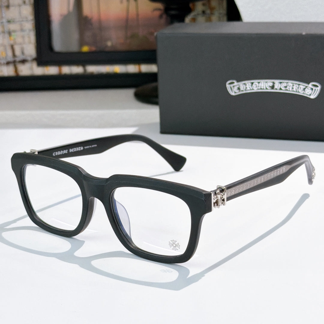 Dark green square eyeglasses with clear lenses and silver-tone temple detail