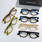 Assorted square eyeglasses with clear lenses in yellow, green, black, and transparent frames