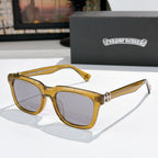 Gold-tone square cat-eye sunglasses with light pink lenses and jeweled bridge