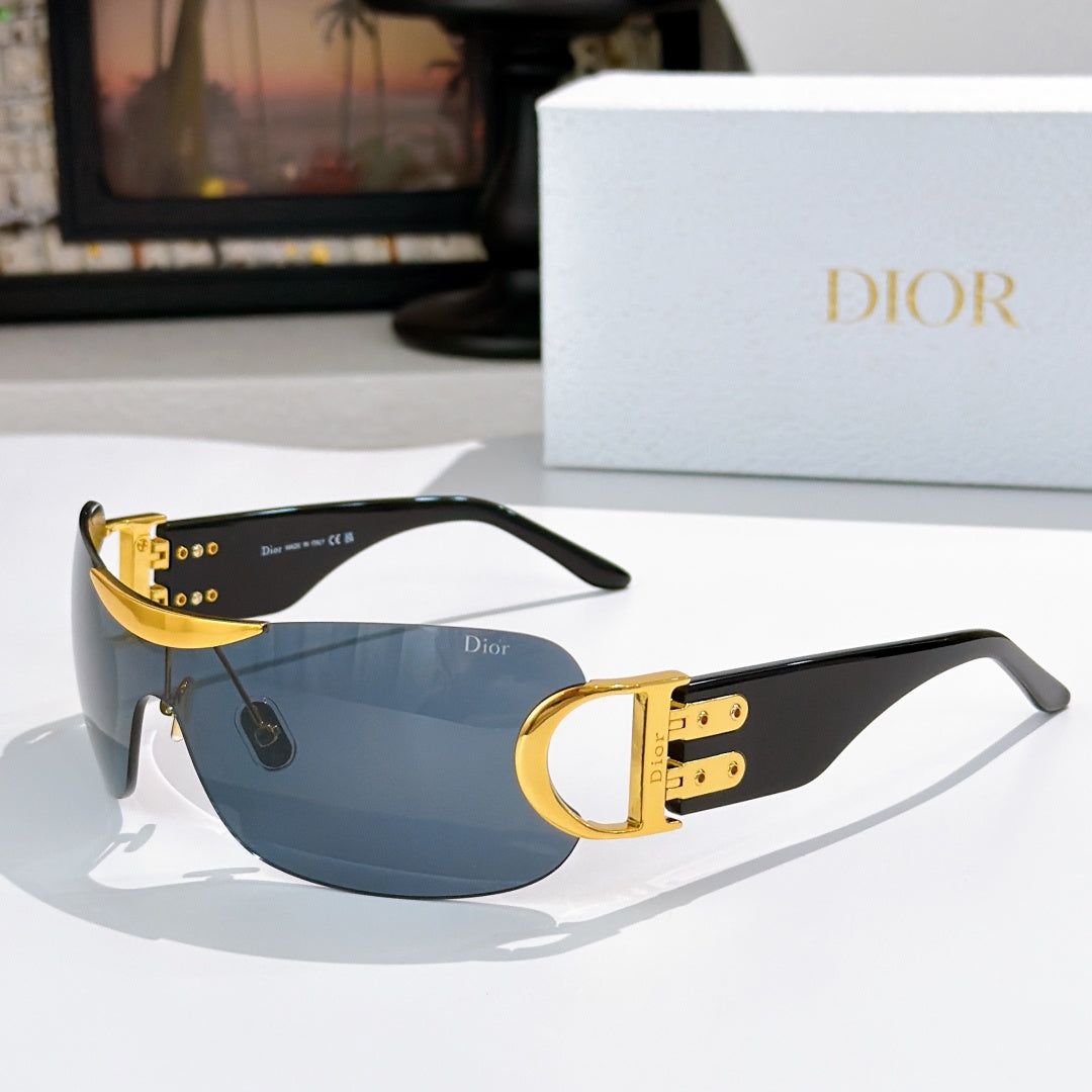 Dior sunglasses with black frame, gold temples, and blue tinted lenses