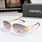 Gold-tone aviator sunglasses with pink gradient lenses and Chanel emblem on the lens