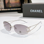 Silver-tone aviator sunglasses with light gray lenses and Chanel logo on the lens
