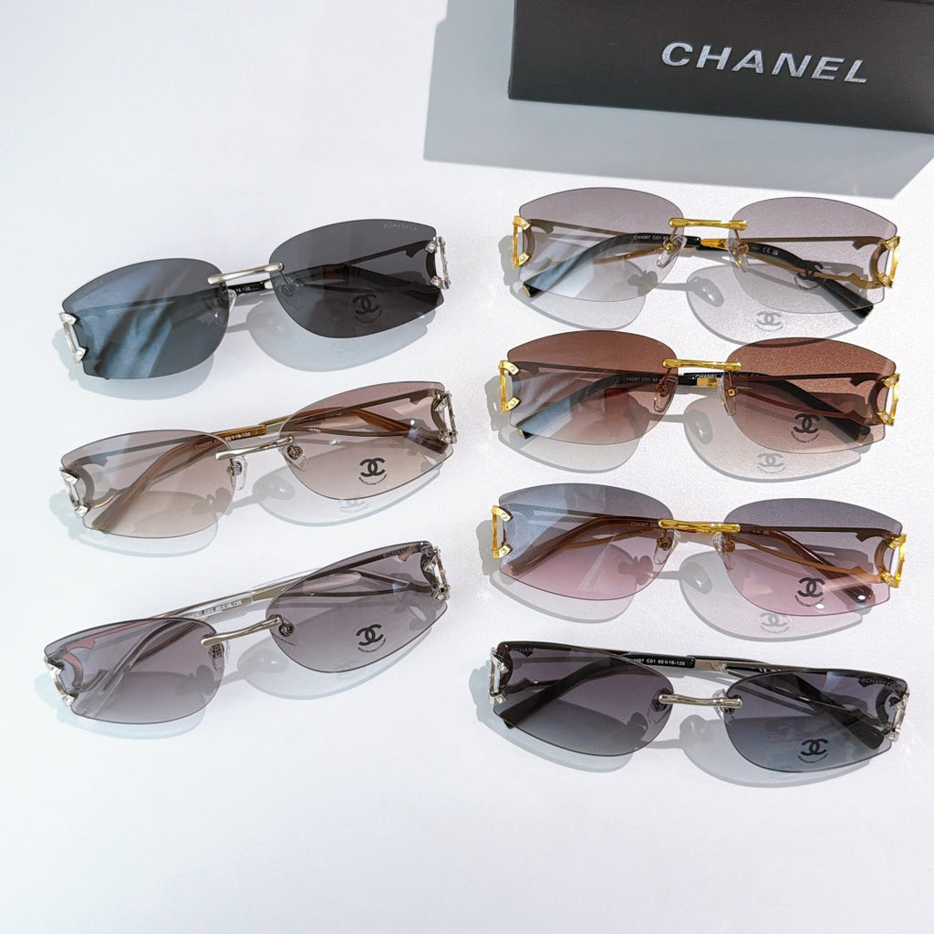 Assorted aviator sunglasses with mixed frames and tinted lenses, Chanel logos on lenses