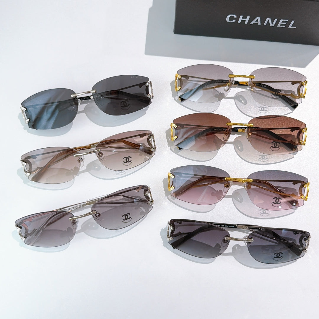 Assorted aviator sunglasses with mixed frames and tinted lenses, Chanel logos on lenses