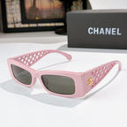 Chanel sunglasses, pink frames with dark lenses and lattice temple details
