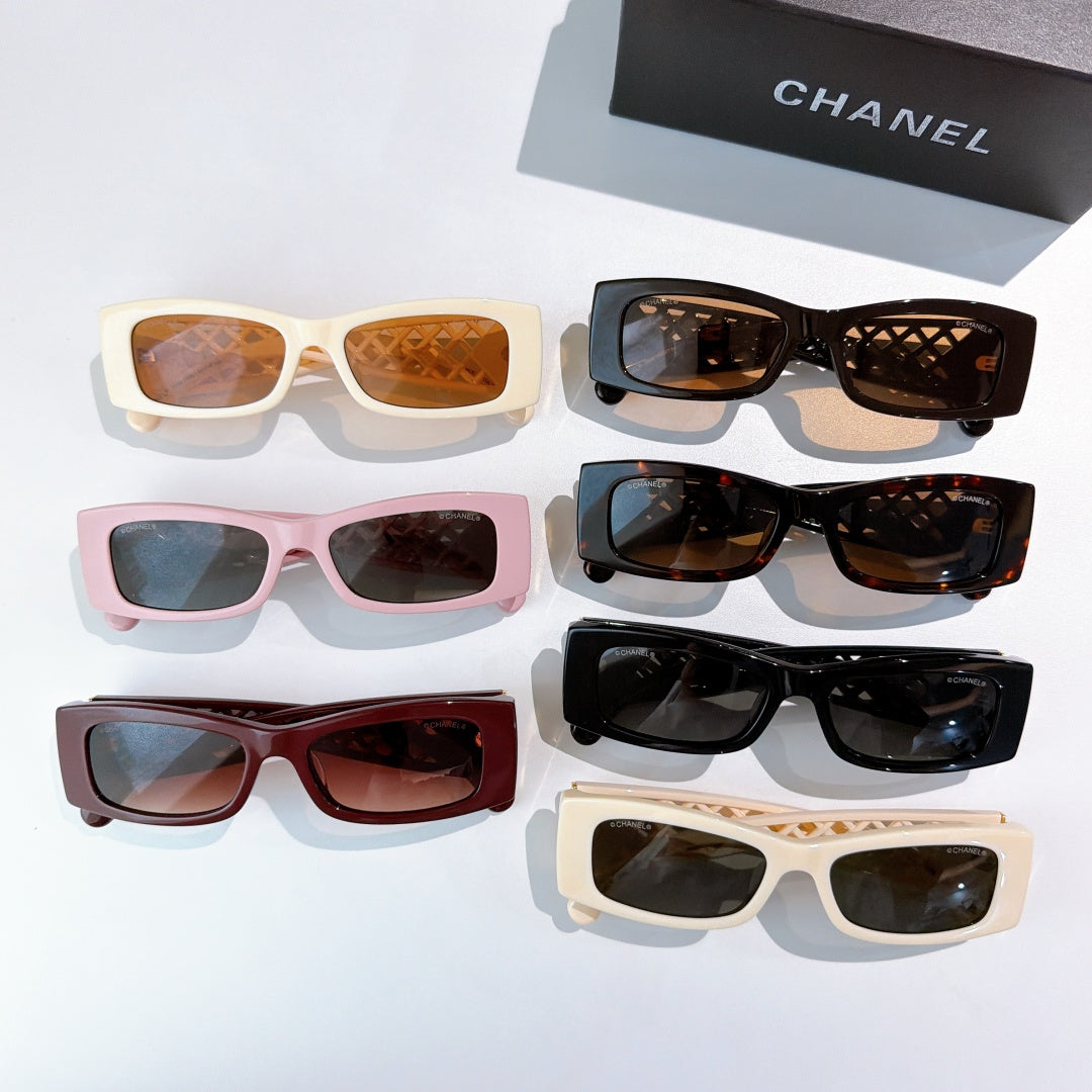 Chanel sunglasses assortment, four frame colors with dark lenses and gold accents