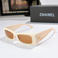 Chanel sunglasses, cream frames with brown lenses and lattice temples