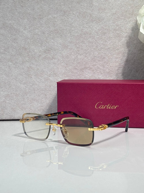 Cartier rectangular glasses with dark maroon frames and gold-tone bridge, shaded lenses