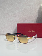 Cartier square glasses with dark blue frames, gold-tone temples and bridge, tinted lenses