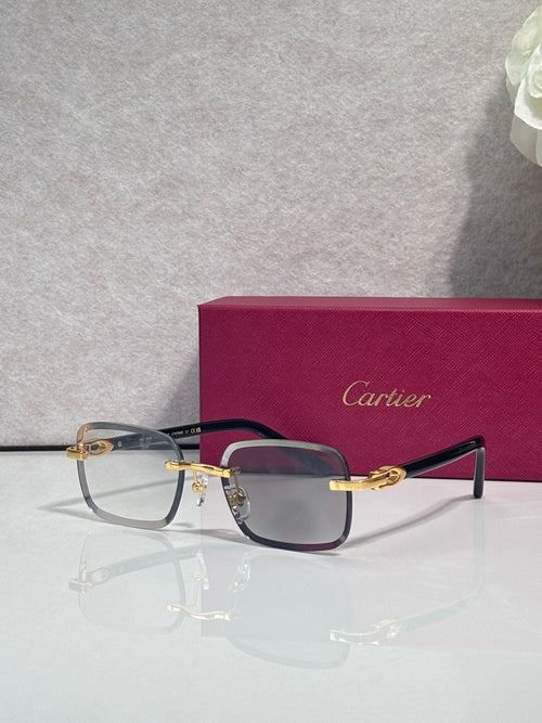Cartier square glasses with dark maroon frames, gold-tone temples, shaded lenses