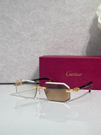 Glasses with burgundy temples, gold trim, and tinted rectangular lenses