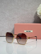 MiuMiu sunglasses, gold frames, brown gradient lenses with square rounded shape