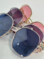 MiuMiu sunglasses assortment, gold frames, blue and pink gradient lenses