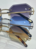 Cartier eyeglasses close-up with purple and blue lenses, gold bridge and metal temples