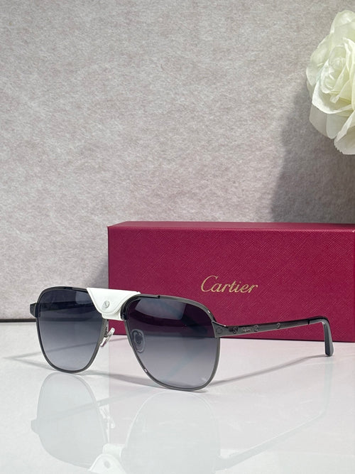 Sunglasses with dark navy frames and tinted lenses, metal bridge detail