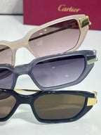 Cartier eyeglasses close-up: beige, navy, and black frames with pink and dark lenses
