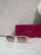 Cartier eyeglasses with light beige frames, rose-tinted lenses, and gold-tone accents