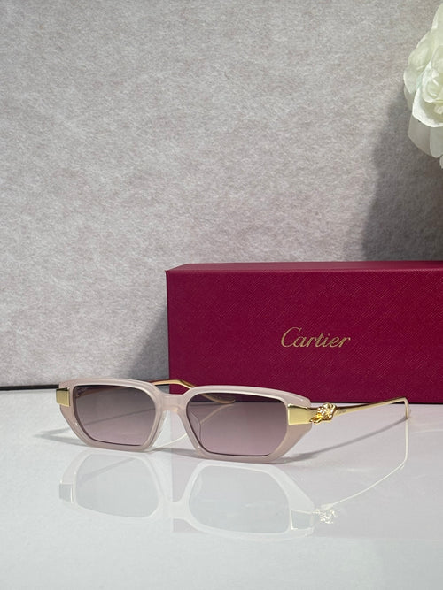 Cartier eyeglasses with light beige frames, rose-tinted lenses, and gold-tone accents