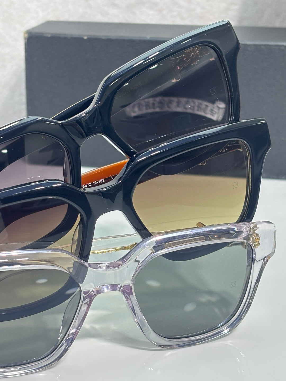 Navy blue and clear square glasses with tinted lenses