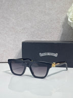 Chrome glasses with dark navy frames and clear lenses, front angled view