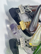 Assorted eyeglasses with clear lenses and silver frames, metal hinge details