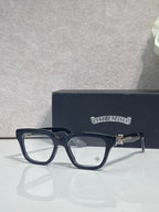 Black and silver eyeglasses with square frames and clear lenses