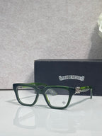 Green and silver eyeglasses with square frames and clear lenses