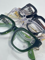 Green eyeglasses with square frames and clear lenses, metal temples