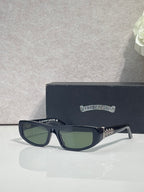 Chrome glasses with dark blue frames and green-tinted lenses, featuring star metal accents.