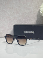 Gold-and-blue square sunglasses with dark lenses and clear temple, ornate hinge