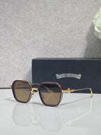Gold-rim square sunglasses with dark lenses, brown frame, and ornate hinge detail
