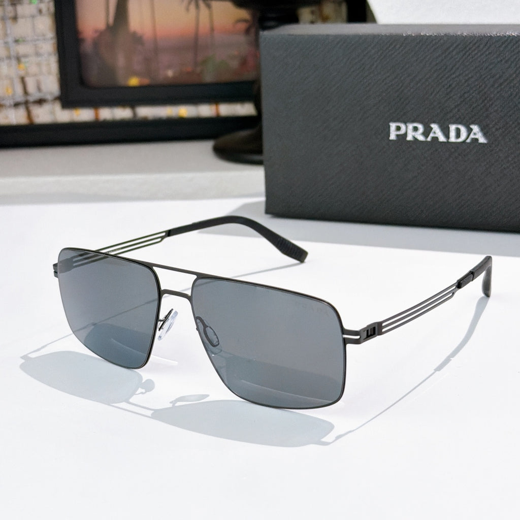 Prada sunglasses with dark-tinted lenses and silver frame, side view