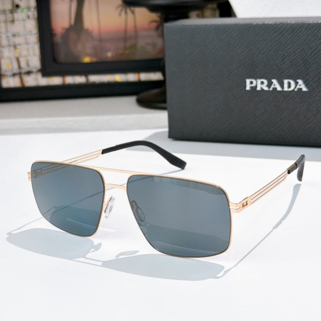 Prada sunglasses with blue-tinted lenses and gold-tone frame, front view
