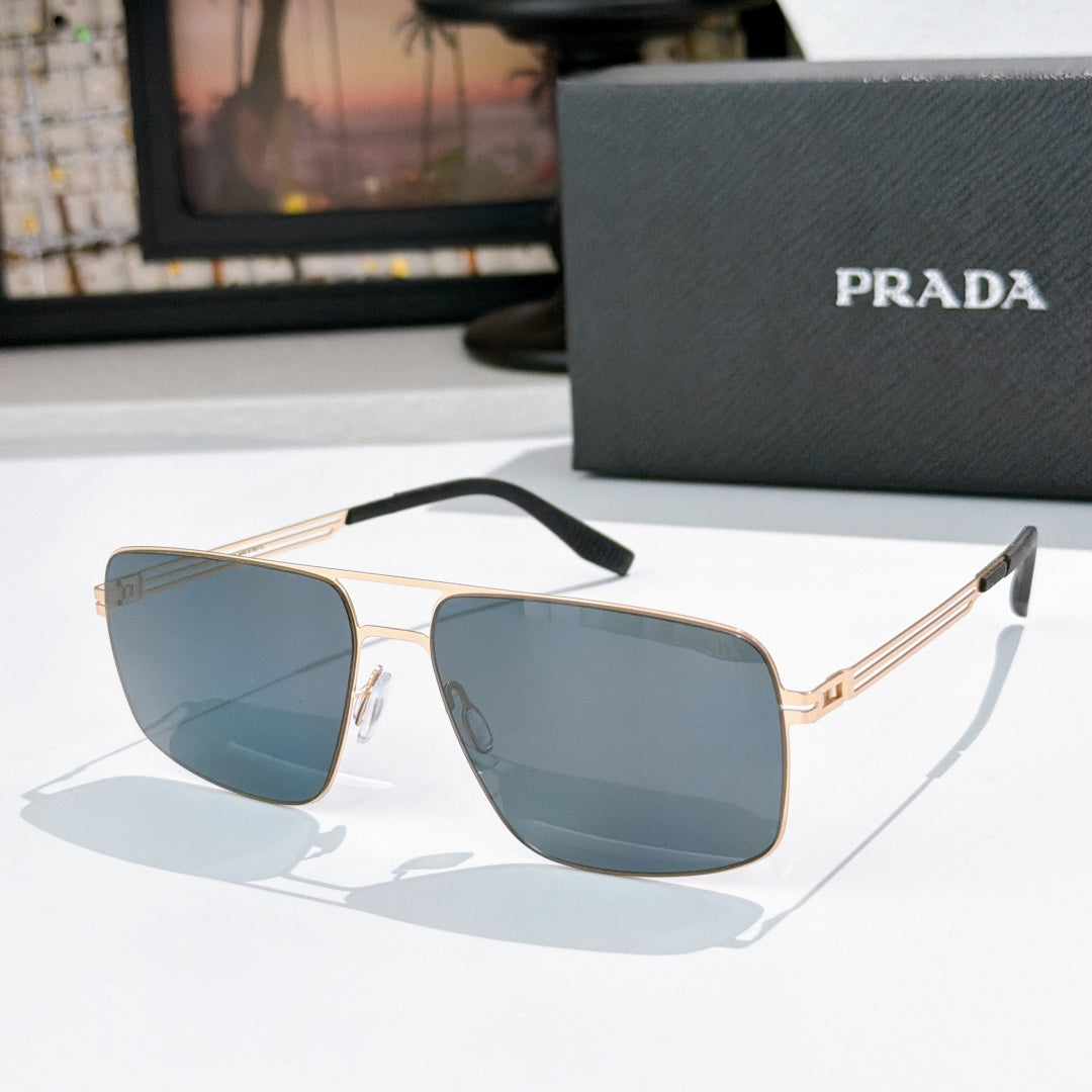 Prada sunglasses with blue-tinted lenses and gold-tone frame, front view