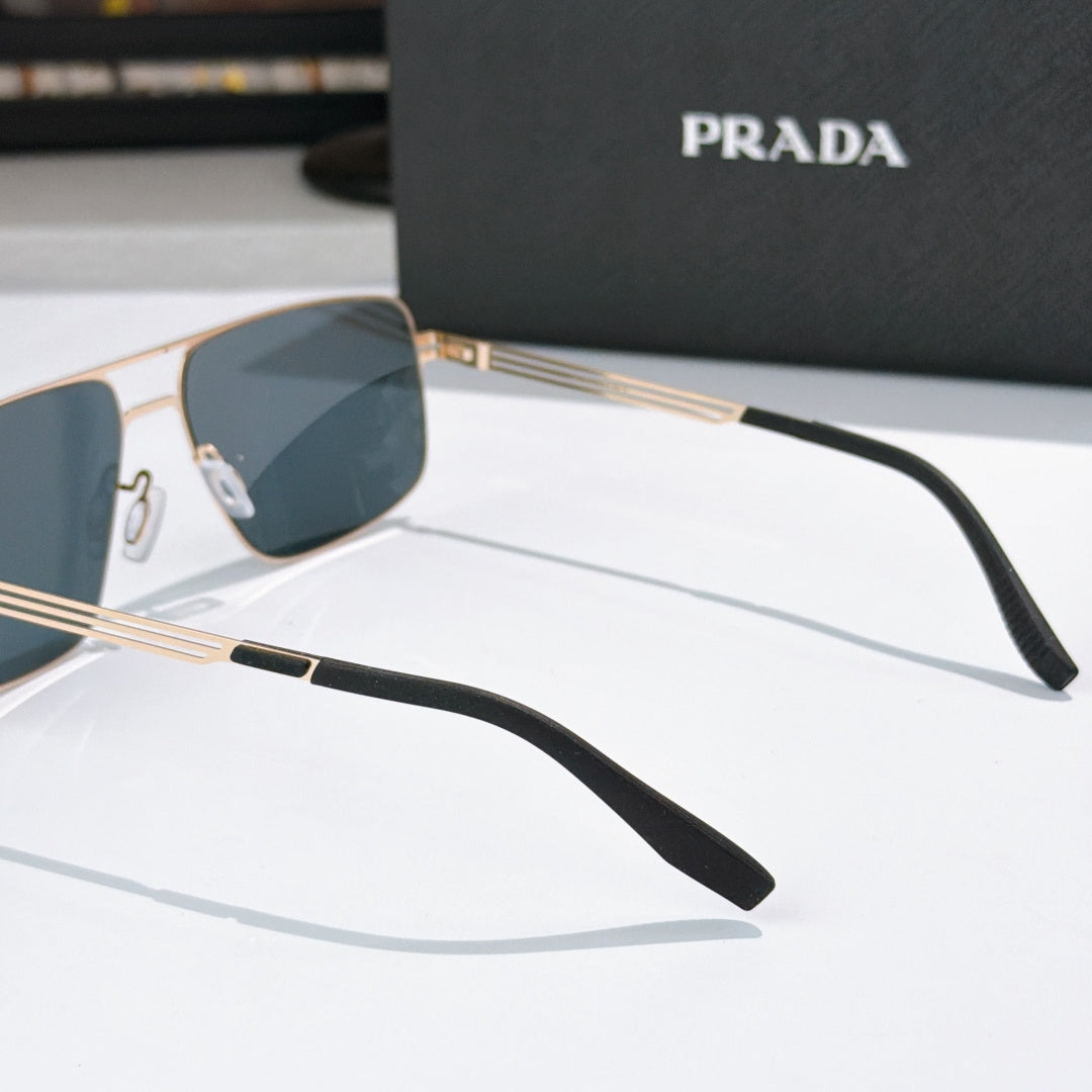Prada sunglasses side view with gold-tone metal arms and dark lens