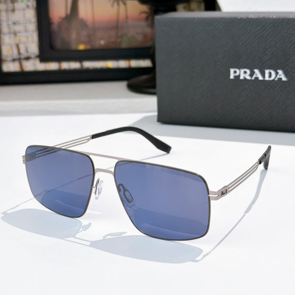 Prada sunglasses with blue-tinted lenses and dark frame, angled view