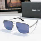 Prada sunglasses with blue-tinted lenses and dark frame, angled view