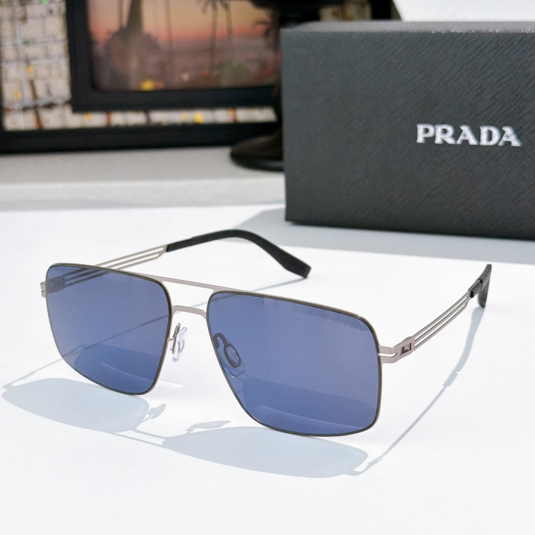 Prada sunglasses with blue-tinted lenses and dark frame, angled view