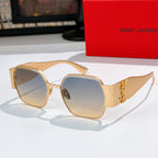 Gold-tone octagonal sunglasses with blue-tinted lenses and gold side emblem