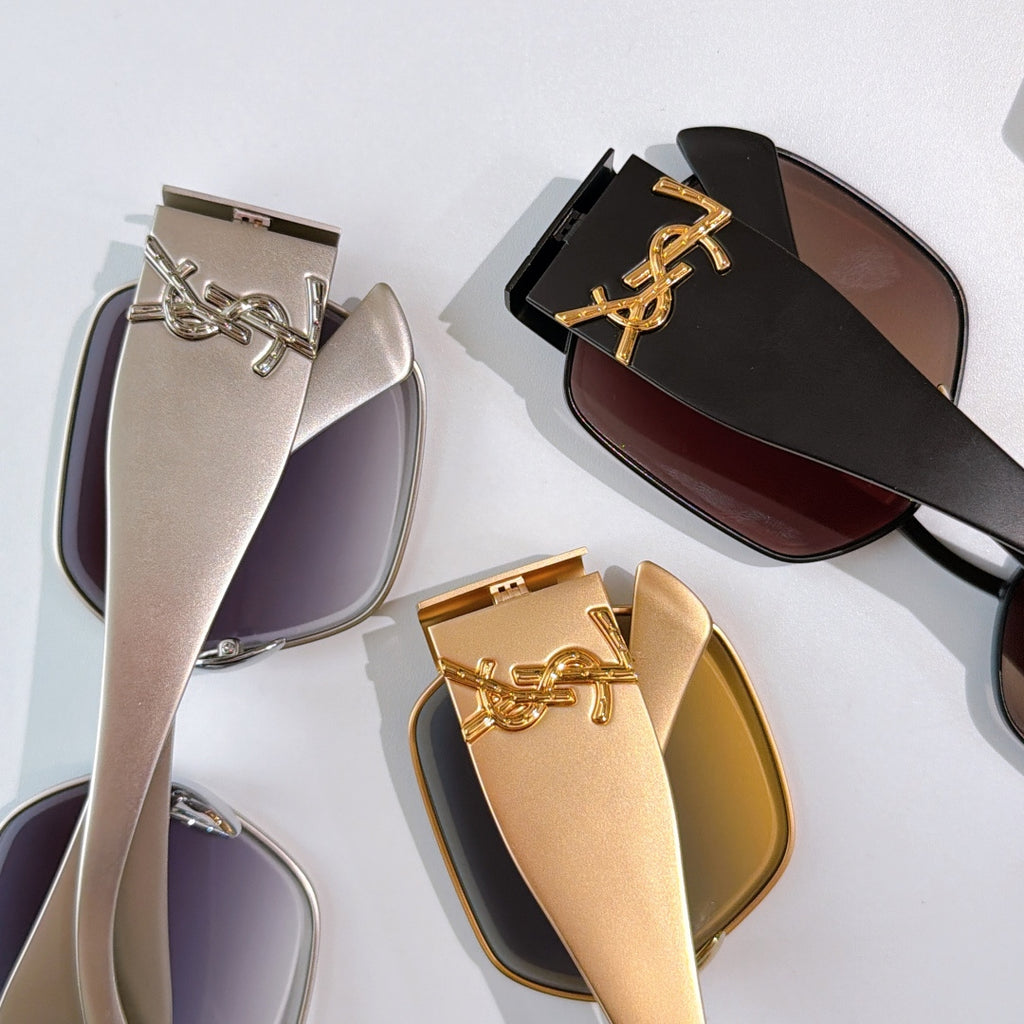 Assorted sunglasses with silver, black, and gold frames and tinted lenses